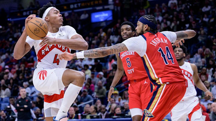 Toronto Raptors forward Scottie Barnes (4) goes up for a shot against New Orleans Pelicans forward Brandon Ingram (14) during the second half at Smoothie King Center. 