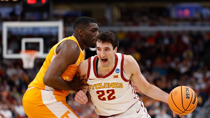 Mar 27, 2026; Chicago, IL, USA; Iowa State Cyclones forward Milan Momcilovic (22) drives the ball against Tennessee Volunteers forward Jaylen Carey (23) in the first half during a Sweet Sixteen game of the Midwest Regional of the men's 2026 NCAA Tournament at United Center. Mandatory Credit: Kamil Krzaczynski-Imagn Images