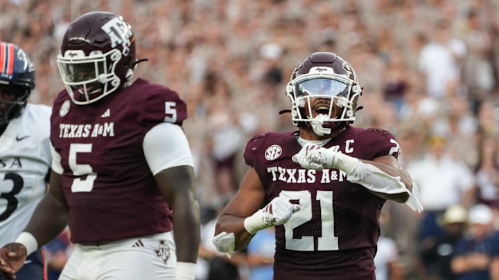 Aug 30, 2025; College Station, Texas, USA; Texas A&M Aggies linebacker Taurean York (21) celebrates after a sack in the first quarter against the UTSA Roadrunners at Kyle Field. Mandatory Credit: Sean Thomas-Imagn Images