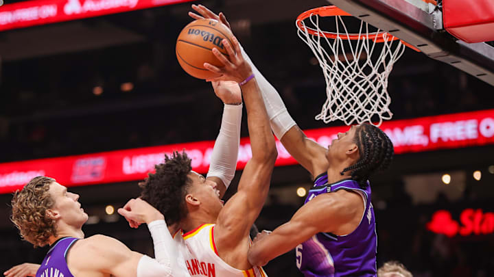 Feb 5, 2026; Atlanta, Georgia, USA; Atlanta Hawks forward Jalen Johnson (1) has his shot blocked by Utah Jazz forward Cody Williams (5) in the first quarter at State Farm Arena. Mandatory Credit: Brett Davis-Imagn Images