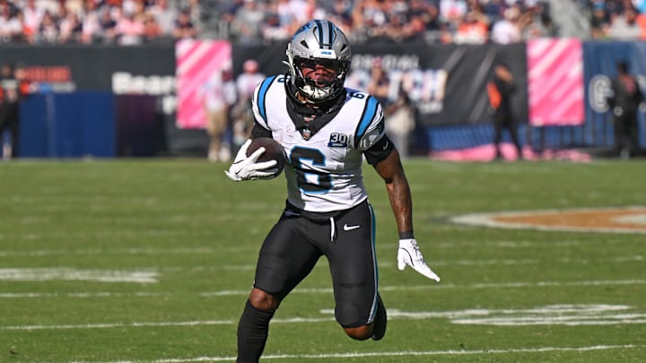 Oct 6, 2024; Chicago, Illinois, USA; Carolina Panthers running back Miles Sanders (6) runs after a catch against the Chicago Bears during the fourth quarter at Soldier Field. Mandatory Credit: Daniel Bartel-Imagn Images