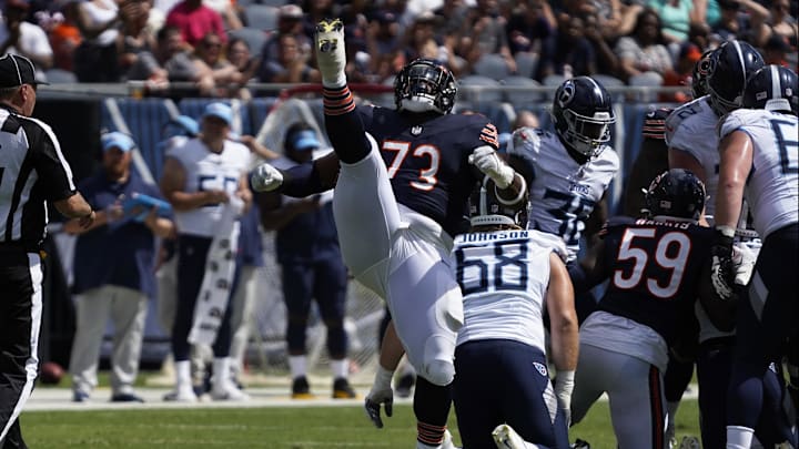 Aug 12, 2023; Chicago, Illinois, USA; Chicago Bears defensive tackle Travis Bell (73) celebrates his Aug 12, 2023; Chicago, Illinois, USA; Chicago Bears defensive tackle Travis Bell (73) celebrates his