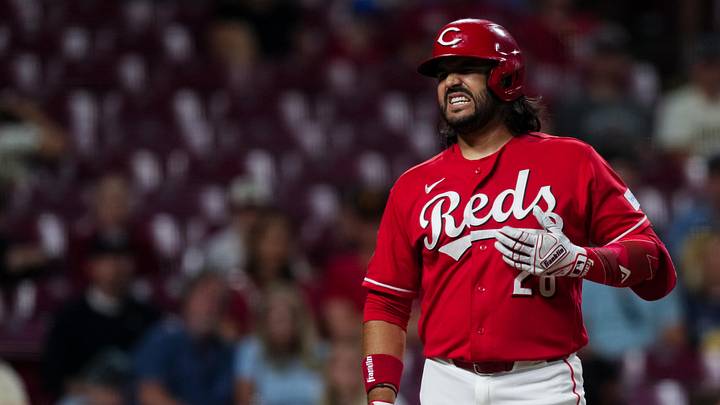 Jun 24, 2026; Cincinnati, Ohio, USA;  Cincinnati Reds designated hitter Eugenio Suarez (28) reacts to being hit by a pitch during the game against the Milwaukee Brewers in the eighth inning at Great American Ball Park. Mandatory Credit: Aaron Doster-Imagn Images