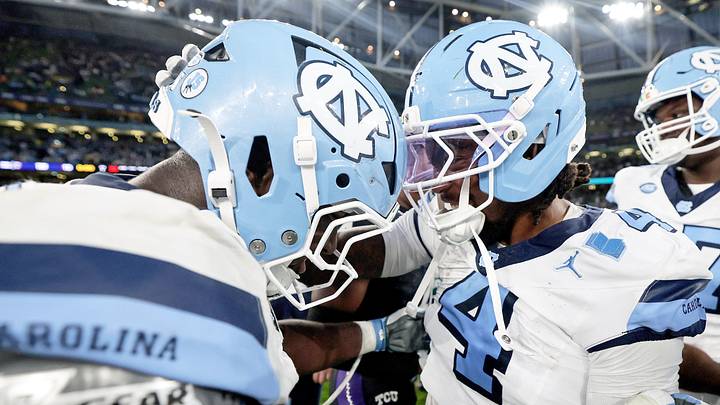Aug 29, 2026; Dublin, Co. Dublin, IRL; North Carolina Tar Heels offensive lineman Andrew Threatt (75) and wide receiver Mason Humphrey (4) celebrate after the game against the TCU Horned Frogs at Aviva Stadium. Mandatory Credit: Laszlo Geczo-Imagn Images Aug 29, 2026; Dublin, Co. Dublin, IRL; North Carolina Tar Heels offensive lineman Andrew Threatt (75) and wide receiver Mason Humphrey (4) celebrate after the game against the TCU Horned Frogs at Aviva Stadium. Mandatory Credit: Laszlo Geczo-Imagn Images