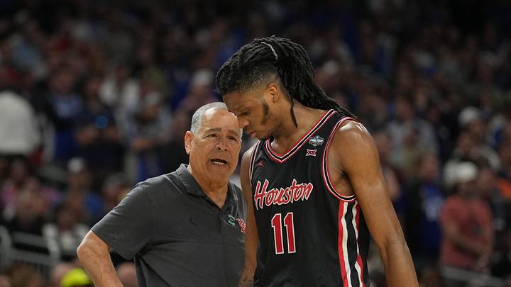 Apr 5, 2025; San Antonio, TX, USA;  Houston Cougars head coach Kelvin Sampson talks with Houston Cougars forward Joseph Tugler (11) against the Duke Blue Devils in the semifinals of the men's Final Four of the 2025 NCAA Tournament at the Alamodome. Mandatory Credit: Robert Deutsch-Imagn Images