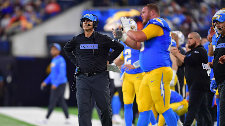 Dec 19, 2024; Inglewood, California, USA; Los Angeles Chargers head coach Jim Harbaugh watches game action against the Denver Broncos during the first half at SoFi Stadium.