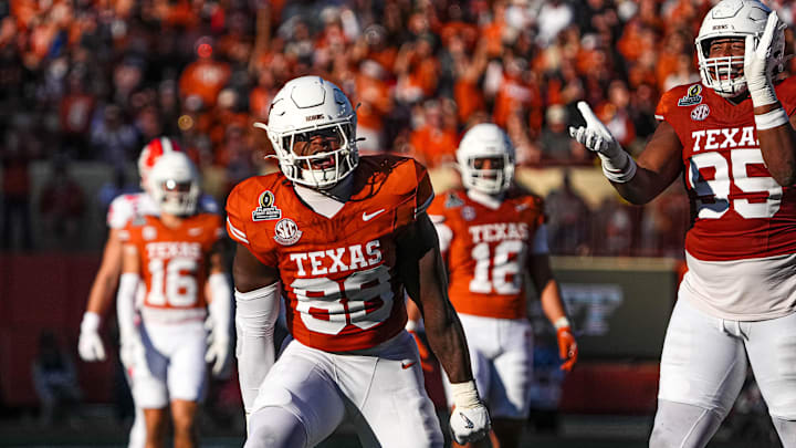 Texas Longhorns edge rusher Barryn Sorrell (88) celebrates a sack on Clemson quarterback Cade Klubnik (2) during the first round of the College Football Playoffs at Darrell K Royal-Texas Memorial Stadium on Saturday, Dec. 21, 2024.