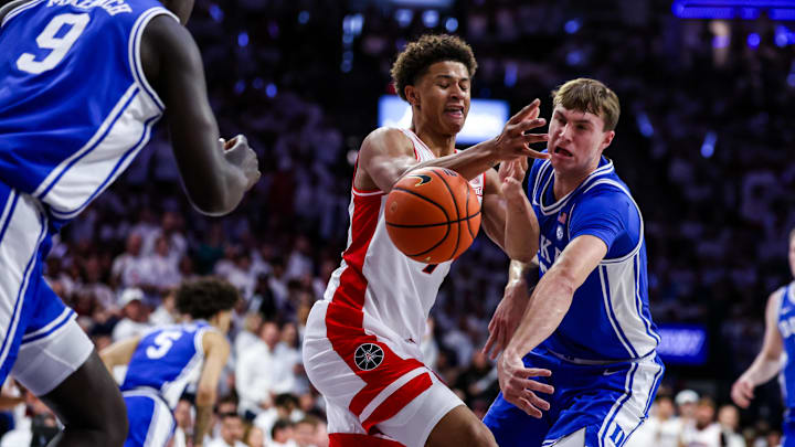 Nov 22, 2024; Tucson, Arizona, USA; Duke Blue Devils forward Cooper Flagg hits the ball out of the hands of Arizona Wildcats forward Carter Bryant (9) during the first half at McKale Center Nov 22, 2024; Tucson, Arizona, USA; Duke Blue Devils forward Cooper Flagg hits the ball out of the hands of Arizona Wildcats forward Carter Bryant (9) during the first half at McKale Center