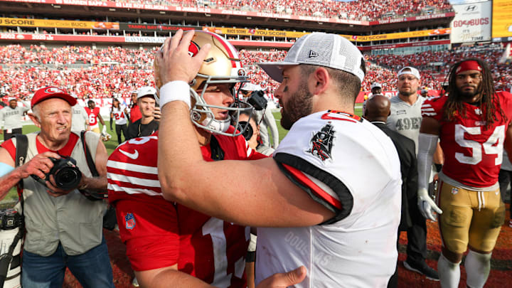 Nov 10, 2024; Tampa, Florida, USA; San Francisco 49ers quarterback Brock Purdy (13) greets Tampa Bay Buccaneers quarterback Baker Mayfield (6) after a game at Raymond James Stadium. Mandatory Credit: Nathan Ray Seebeck-Imagn Images