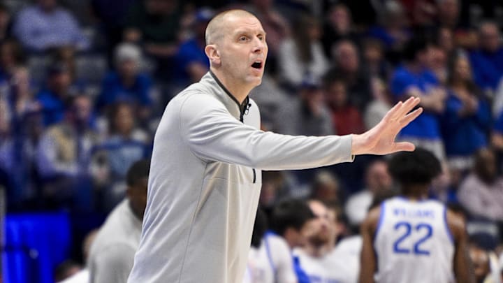 Mar 13, 2025; Nashville, TN, USA;  Kentucky Wildcats head coach Mark Pope gives instructions to his team against the Oklahoma Sooners during the first half at Bridgestone Arena. Mandatory Credit: Steve Roberts-Imagn Images