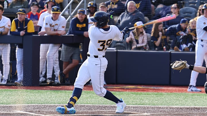 West Virginia University designated hitter Kyle West