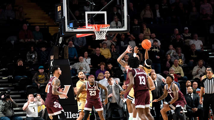 Vanderbilt Commodores guard Ezra Manjon (5) puts up a last second shot against the Texas A&M