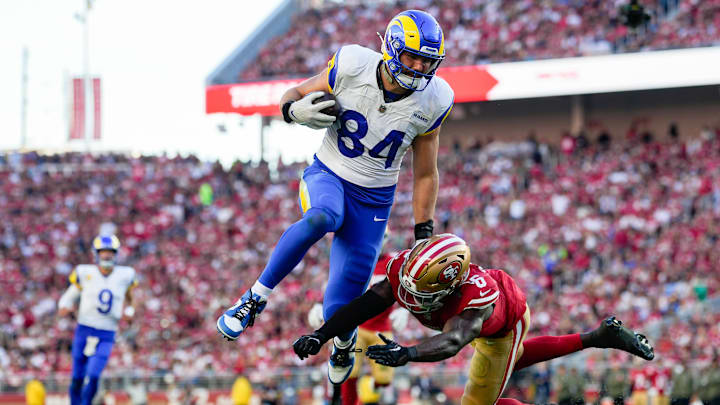 Nov 9, 2025; Santa Clara, California, USA; Los Angeles Rams tight end Colby Parkinson (84) runs after a catch against San Francisco 49ers safety Malik Mustapha (6) during the fourth quarter at Levi's Stadium. Mandatory Credit: Kyle Terada-Imagn Images
