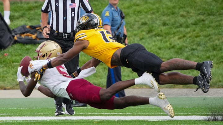 Sep 14, 2024; Columbia, Missouri, USA; Boston College Eagles wide receiver Jaedn Skeete (6) can’t hang on to the ball as Missouri Tigers safety Daylan Carnell (13) defends during the second half at Faurot Field at Memorial Stadium. Mandatory Credit: Denny Medley-Imagn Images