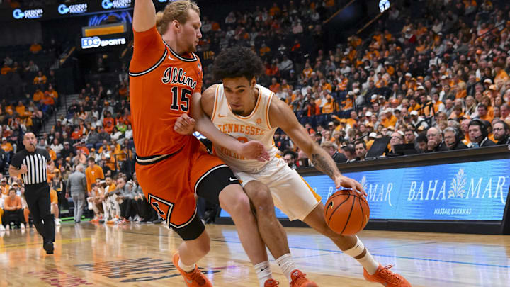 Dec 6, 2025; Nashville, Tennessee, USA; Tennessee Volunteers guard Bishop Boswell (3) drives baseline past Illinois Fighting Illini forward Jake Davis (15) during the first half at Bridgestone Arena. Mandatory Credit: Steve Roberts-Imagn Images Dec 6, 2025; Nashville, Tennessee, USA; Tennessee Volunteers guard Bishop Boswell (3) drives baseline past Illinois Fighting Illini forward Jake Davis (15) during the first half at Bridgestone Arena. Mandatory Credit: Steve Roberts-Imagn Images