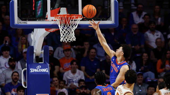 Jan 18, 2025; Gainesville, Florida, USA; Florida Gators guard Walter Clayton Jr. (1) makes a layup against the Texas Longhorns during the first half at Exactech Arena at the Stephen C. O'Connell Center. Mandatory Credit: Matt Pendleton-Imagn Images