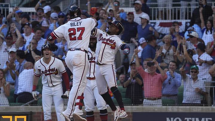 Sep 29, 2026; Cumberland, Georgia, USA;  Atlanta Braves third baseman Austin Riley (27) reacts after hitting a three run home run against the Philadelphia Phillies in the eighth inning during game one of the Wildcard round for the 2026 MLB Playoffs at Truist Park.  Mandatory Credit: Dale Zanine-Imagn Images