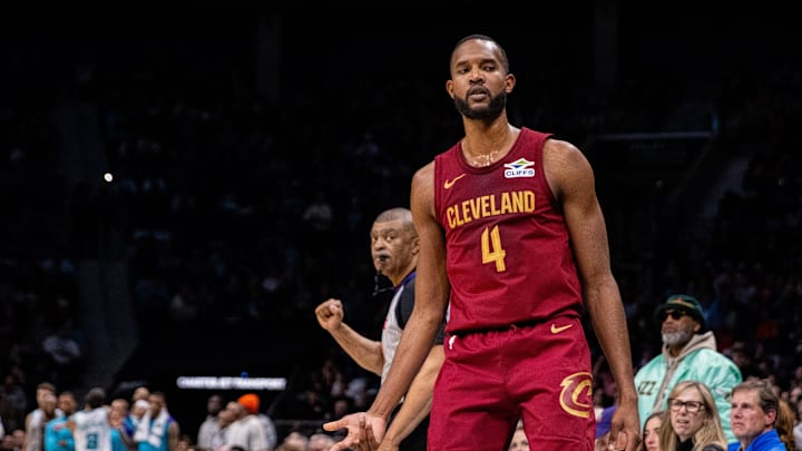 Mar 7, 2025; Charlotte, North Carolina, USA; Cleveland Cavaliers forward Evan Mobley (4) celebrates a three point basket against the Charlotte Hornets during the fourth quarter at Spectrum Center. Mandatory Credit: Scott Kinser-Imagn Images