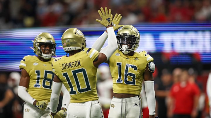 Sep 1, 2023; Atlanta, Georgia, USA; Georgia Tech Yellow Jackets defensive back K.J. Wallace (16) reacts after a pass breakup with defensive back Kenan Johnson (10) against the Louisville Cardinals in the first quarter at Mercedes-Benz Stadium. Mandatory Credit: Brett Davis-Imagn Images Sep 1, 2023; Atlanta, Georgia, USA; Georgia Tech Yellow Jackets defensive back K.J. Wallace (16) reacts after a pass breakup with defensive back Kenan Johnson (10) against the Louisville Cardinals in the first quarter at Mercedes-Benz Stadium. Mandatory Credit: Brett Davis-Imagn Images