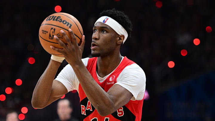 Apr 20, 2026; Cleveland, Ohio, USA; Toronto Raptors guard Ja'kobe Walter (14) shoots a three point basket during the second half during game two of the first round of the 2026 NBA Playoffs against the Cleveland Cavaliers at Rocket Arena. Mandatory Credit: David Dermer-Imagn Images