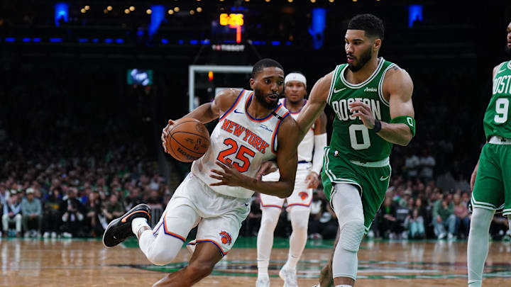 New York Knicks forward Mikal Bridges drives the ball against Boston Celtics forward Jayson Tatum. Mandatory Credit: David Butler II-Imagn Images