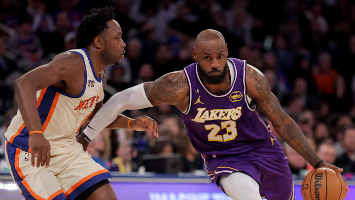Feb 1, 2026; New York, New York, USA; Los Angeles Lakers forward LeBron James (23) drives to the basket against New York Knicks forward OG Anunoby (8) during the third quarter at Madison Square Garden. Mandatory Credit: Brad Penner-Imagn Images