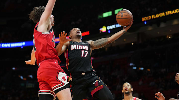 Miami Heat guard Jahmir Young (17) takes a shot as Chicago Bulls forward Dalen Terry (7)