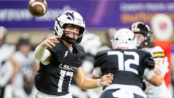 Liberty's Reece Rettig (17) throws to a receiver on Friday, Nov. 15, 2024, at the UNI-Dome in Cedar Falls, IA.