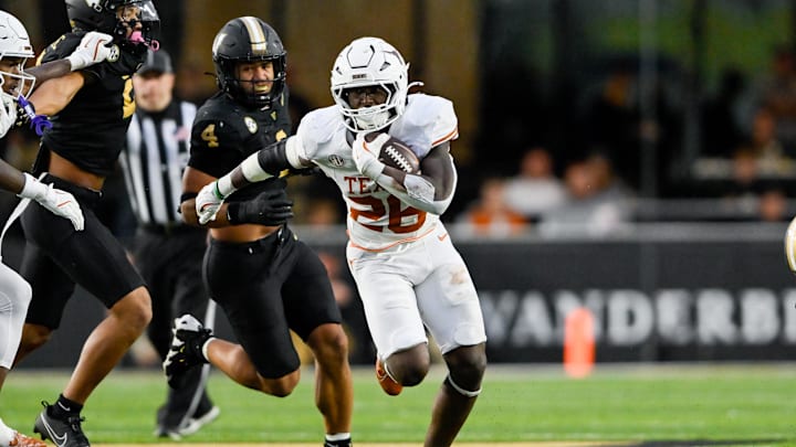 Oct 26, 2024; Nashville, Tennessee, USA;  Texas Longhorns running back Quintrevion Wisner (26) runs the ball against the Vanderbilt Commodores during the second half at FirstBank Stadium. Mandatory Credit: Steve Roberts-Imagn Images