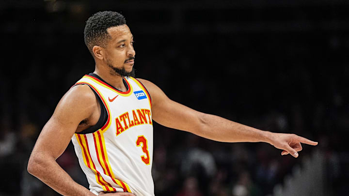 Mar 12, 2026; Atlanta, Georgia, USA; Atlanta Hawks guard CJ McCollum (3) reacts on the floor against the Brooklyn Nets during the second half at State Farm Arena. Mandatory Credit: Dale Zanine-Imagn Images