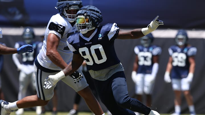 Jul 30, 2024; Oxnard, CA, USA; Dallas Cowboys defensive end DeMarcus Lawrence (90) rushes during training camp at the River Ridge Playing Fields in Oxnard, California. Mandatory Credit: Jason Parkhurst-Imagn Images Jul 30, 2024; Oxnard, CA, USA; Dallas Cowboys defensive end DeMarcus Lawrence (90) rushes during training camp at the River Ridge Playing Fields in Oxnard, California. Mandatory Credit: Jason Parkhurst-Imagn Images