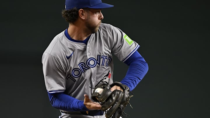 Toronto Blue Jays third baseman Ernie Clement (28) attempts to control the ball as he throws to second base during the fourth inning against the Texas Rangers at Globe Life Field on Sept 17.