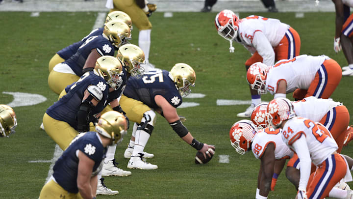 Dec 19, 2020; Charlotte, NC, USA; Notre Dame Fighting Irish and Clemson Tigers at the line of scrimmage in the first quarter at Bank of America Stadium. Dec 19, 2020; Charlotte, NC, USA; Notre Dame Fighting Irish and Clemson Tigers at the line of scrimmage in the first quarter at Bank of America Stadium.