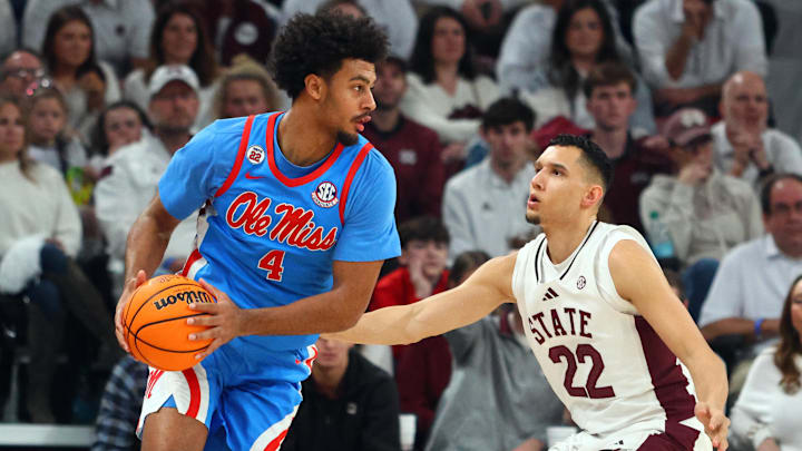 Jan 18, 2025; Starkville, Mississippi, USA; Mississippi Rebels forward Jaemyn Brakefield (4) drives to the basket as Mississippi State Bulldogs forward RJ Melendez (22) defends during the second half at Humphrey Coliseum. Mandatory Credit: Petre Thomas-Imagn Images Jan 18, 2025; Starkville, Mississippi, USA; Mississippi Rebels forward Jaemyn Brakefield (4) drives to the basket as Mississippi State Bulldogs forward RJ Melendez (22) defends during the second half at Humphrey Coliseum. Mandatory Credit: Petre Thomas-Imagn Images