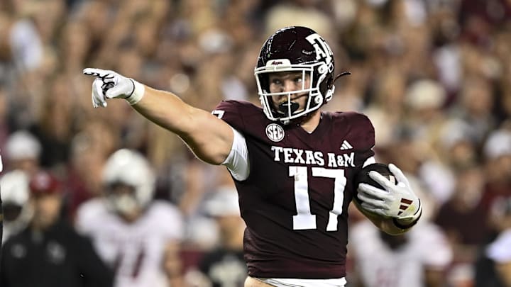 Texas A&M Aggies tight end Theo Melin Ohrstrom (17) motions against the New Mexico State Aggies during the first half at Kyle Field. 