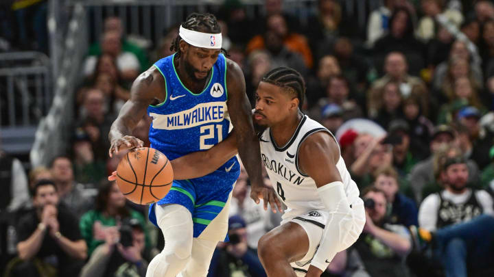 Mar 21, 2024; Milwaukee, Wisconsin, USA; Brooklyn Nets guard Dennis Smith Jr. (4) tries to steal the ball from Milwaukee Bucks guard Patrick Beverley (21) in the third quarter at Fiserv Forum. Mandatory Credit: Benny Sieu-USA TODAY Sports Mar 21, 2024; Milwaukee, Wisconsin, USA; Brooklyn Nets guard Dennis Smith Jr. (4) tries to steal the ball from Milwaukee Bucks guard Patrick Beverley (21) in the third quarter at Fiserv Forum. Mandatory Credit: Benny Sieu-USA TODAY Sports