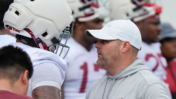 July 30, 2025; Tuscaloosa, AL, USA; Defensive coordinator Kane Wommack talks to defensive lineman London Simmons during the first practice session of the preseason for the Alabama Crimson Tide.