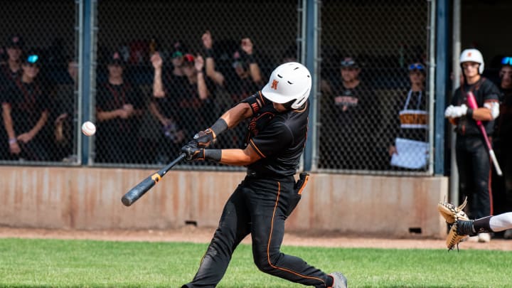 Northville's Dante Nori hits during the Division 1 baseball regional on Thursday, June 6, 2024. Northville's Dante Nori hits during the Division 1 baseball regional on Thursday, June 6, 2024.