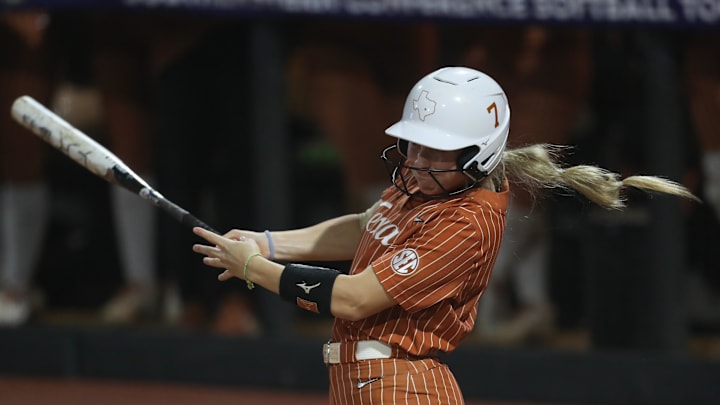May 9, 2025; Athens, GA, USA; Texas outfielder Ashton Maloney (7) hits a single during a game against Texas A&M at Jack Turner Stadium. Mandatory Credit: Mady Mertens-Imagn Images