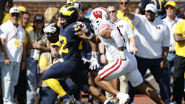 Oct 4, 2025; Ann Arbor, Michigan, USA; Michigan Wolverines running back Justice Haynes (22) rushes in the first half against the Wisconsin Badgers at Michigan Stadium. Mandatory Credit: Rick Osentoski-Imagn Images Oct 4, 2025; Ann Arbor, Michigan, USA; Michigan Wolverines running back Justice Haynes (22) rushes in the first half against the Wisconsin Badgers at Michigan Stadium. Mandatory Credit: Rick Osentoski-Imagn Images