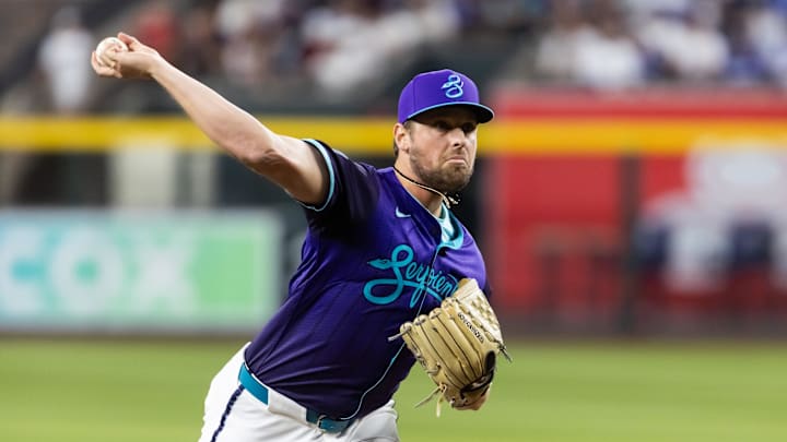 May 9, 2025; Phoenix, Arizona, USA; Arizona Diamondbacks pitcher Kevin Ginkel against the Los Angeles Dodgers at Chase Field. Mandatory Credit: Mark J. Rebilas-Imagn Images