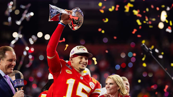 Feb 11, 2024; Paradise, Nevada, USA; Kansas City Chiefs quarterback Patrick Mahomes (15) celebrates with the Vince Lombardi Trophy after defeating the San Francisco 49ers in overtime of Super Bowl LVIII at Allegiant Stadium. Mandatory Credit: Mark J. Rebilas-USA TODAY Sports