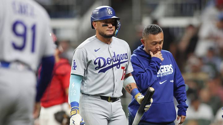 Oct 6, 2026; Cumberland, Georgia, USA; iLos Angeles Dodgers second baseman Miguel Rojas (72) leaves the game after hitting a foul ball off his body against the Atlanta Braves in game three of the NLDS for the 2026 MLB Playoffs at Truist Park. Mandatory Credit: Brett Davis-Imagn Images Oct 6, 2026; Cumberland, Georgia, USA; iLos Angeles Dodgers second baseman Miguel Rojas (72) leaves the game after hitting a foul ball off his body against the Atlanta Braves in game three of the NLDS for the 2026 MLB Playoffs at Truist Park. Mandatory Credit: Brett Davis-Imagn Images