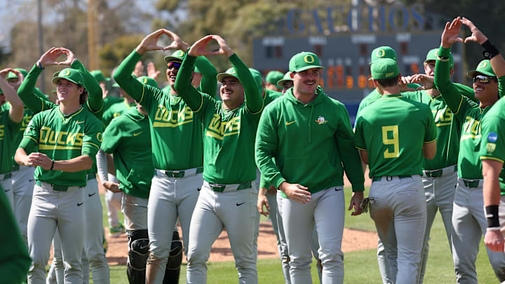 May 31, 2024; Santa Barbara, CA, USA;  Oregon Ducks players celebrate victory after defeating San Diego 5-4 in extra innings of an NCAA Baseball Santa Barbara Regional game at Caesar Uyesaka Stadium. Mandatory Credit: Kiyoshi Mio-USA TODAY Sports