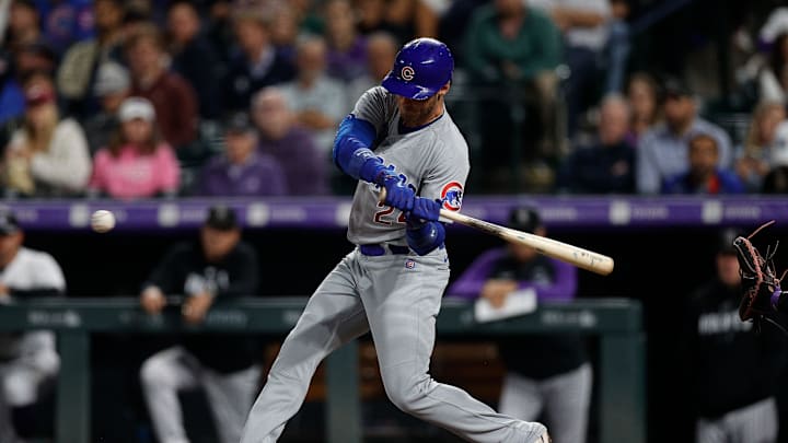 Sep 11, 2023; Denver, Colorado, USA; Chicago Cubs center fielder Cody Bellinger (24) hits a double
