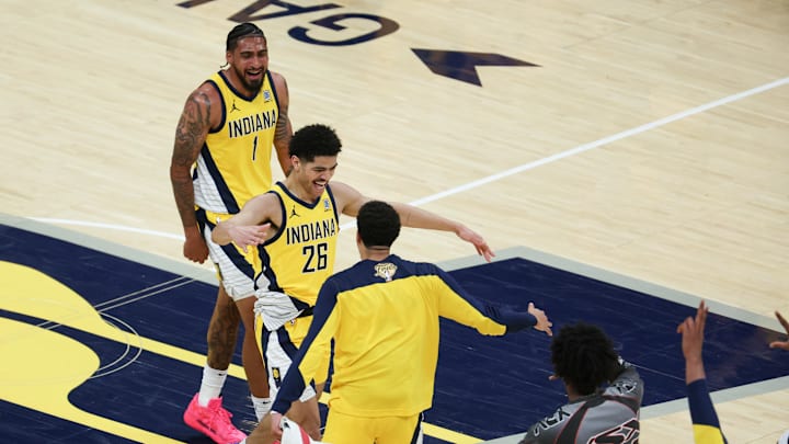 Jun 19, 2025; Indianapolis, Indiana, USA; Indiana Pacers guard Ben Sheppard (26) celebrates with teammates after hitting a shot against the Oklahoma City Thunder as time expires in the third quarter during game six of the 2025 NBA Finals at Gainbridge Fieldhouse. Mandatory Credit: Trevor Ruszkowski-Imagn Images