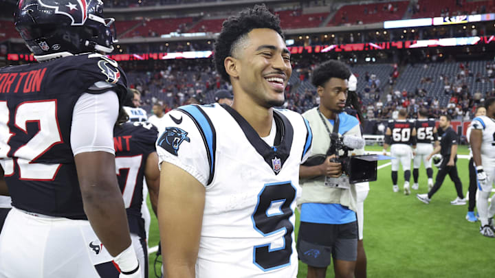 Aug 16, 2025; Houston, Texas, USA; Carolina Panthers quarterback Bryce Young (9) smiles on the field after the game against the Houston Texans at NRG Stadium. Mandatory Credit: Troy Taormina-Imagn Images