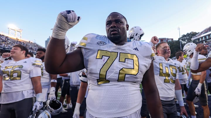 Oct 11, 2025; Atlanta, Georgia, USA; Georgia Tech Yellow Jackets offensive lineman Malachi Carney (72) celebrates after a victory over the Virginia Tech Hokies in the fourth quarter at Bobby Dodd Stadium at Hyundai Field. Mandatory Credit: Brett Davis-Imagn Images
