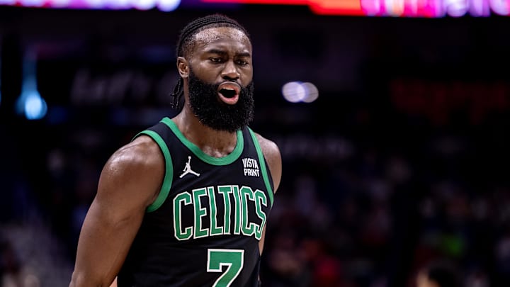 Mar 30, 2024; New Orleans, Louisiana, USA;  Boston Celtics guard Jaylen Brown (7) has a few words with the team attendant after he slips on the court against the New Orleans Pelicans during the first half at Smoothie King Center. Mandatory Credit: Stephen Lew-Imagn Images