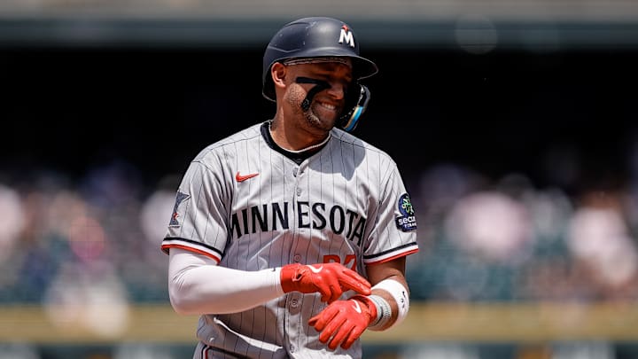 Jul 20, 2025; Denver, Colorado, USA; Minnesota Twins third baseman Royce Lewis (23) gestures as he rounds the bases on a solo home run in the fourth inning against the Colorado Rockies at Coors Field. Mandatory Credit: Isaiah J. Downing-Imagn Images